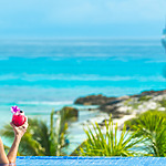 hyatt ziva cancun destination wedding all-inclusive mexico wedding resort infinity pool cocktail lighthouse panorama beach