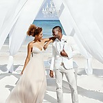 breathtaking spots to host your destination wedding grand palladium jamaica beach pergola couple montego bay