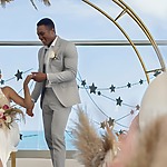 top summer destination wedding resorts of 2022 planet hollywood cancun couple rooftop venue