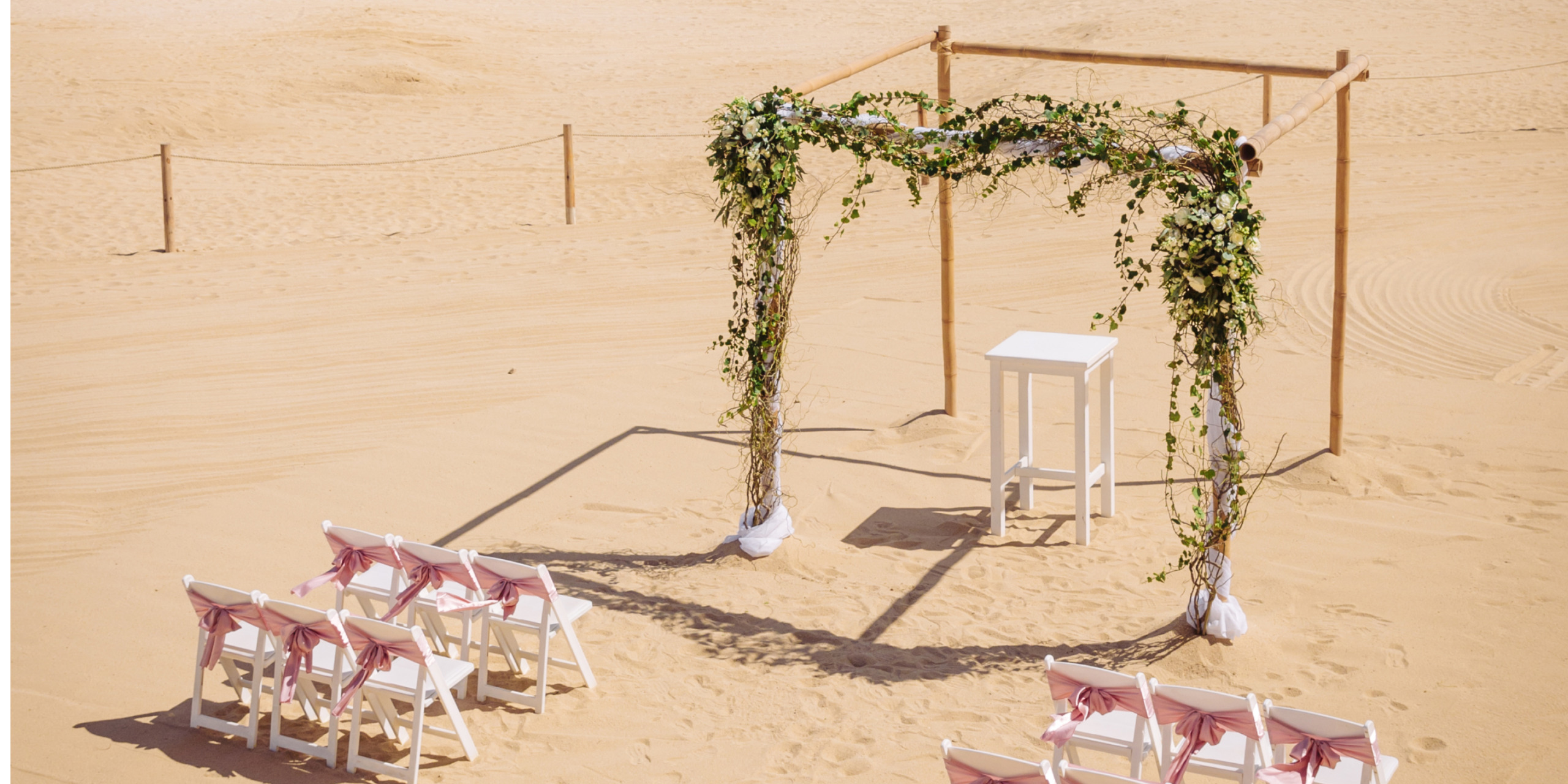RIU Santa Fe beach wedding with canopy and garlands
