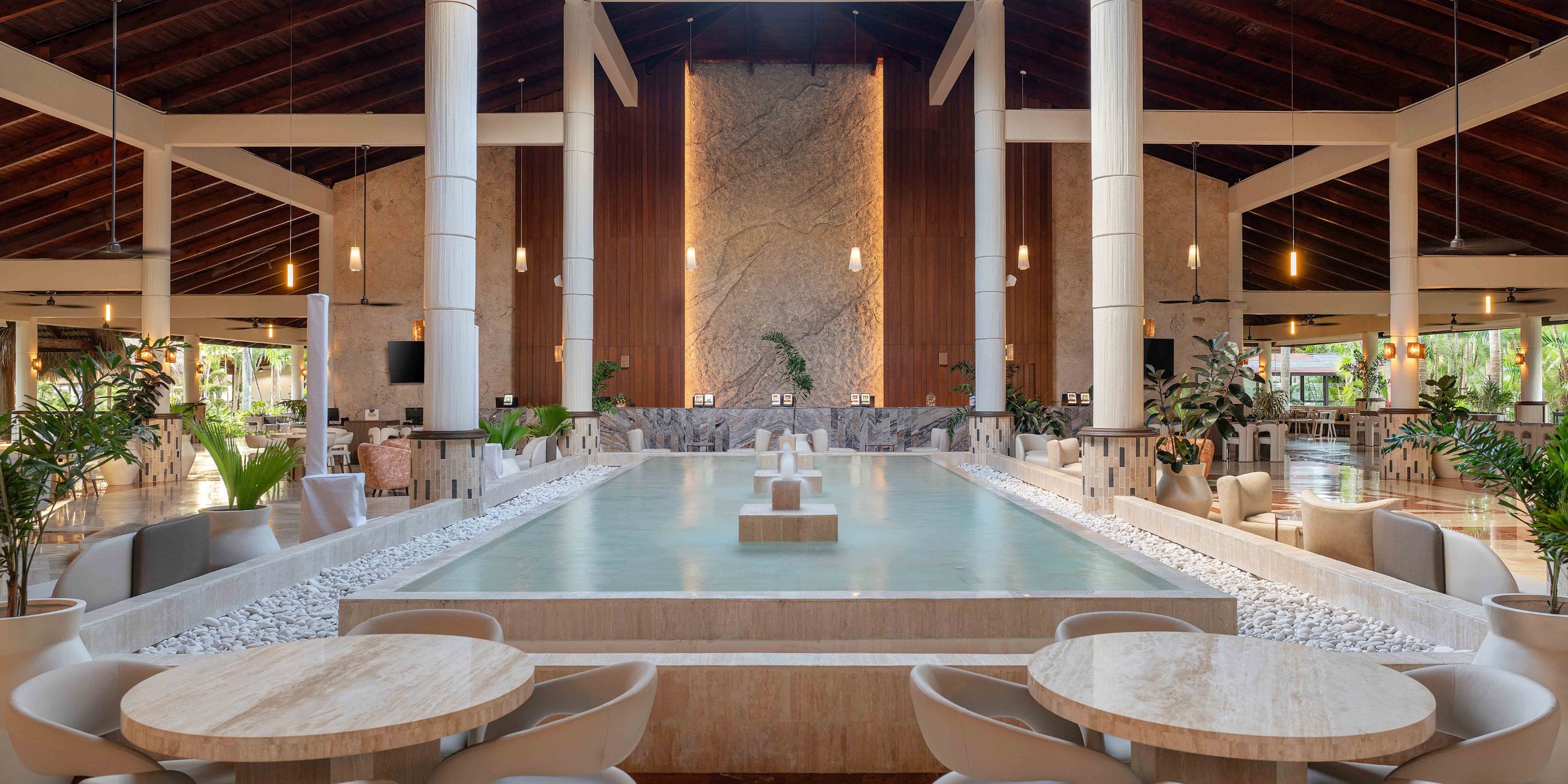 Grand Palladium Bavaro hotel’s spacious lobby with reflecting pool is ideal for a destination wedding.