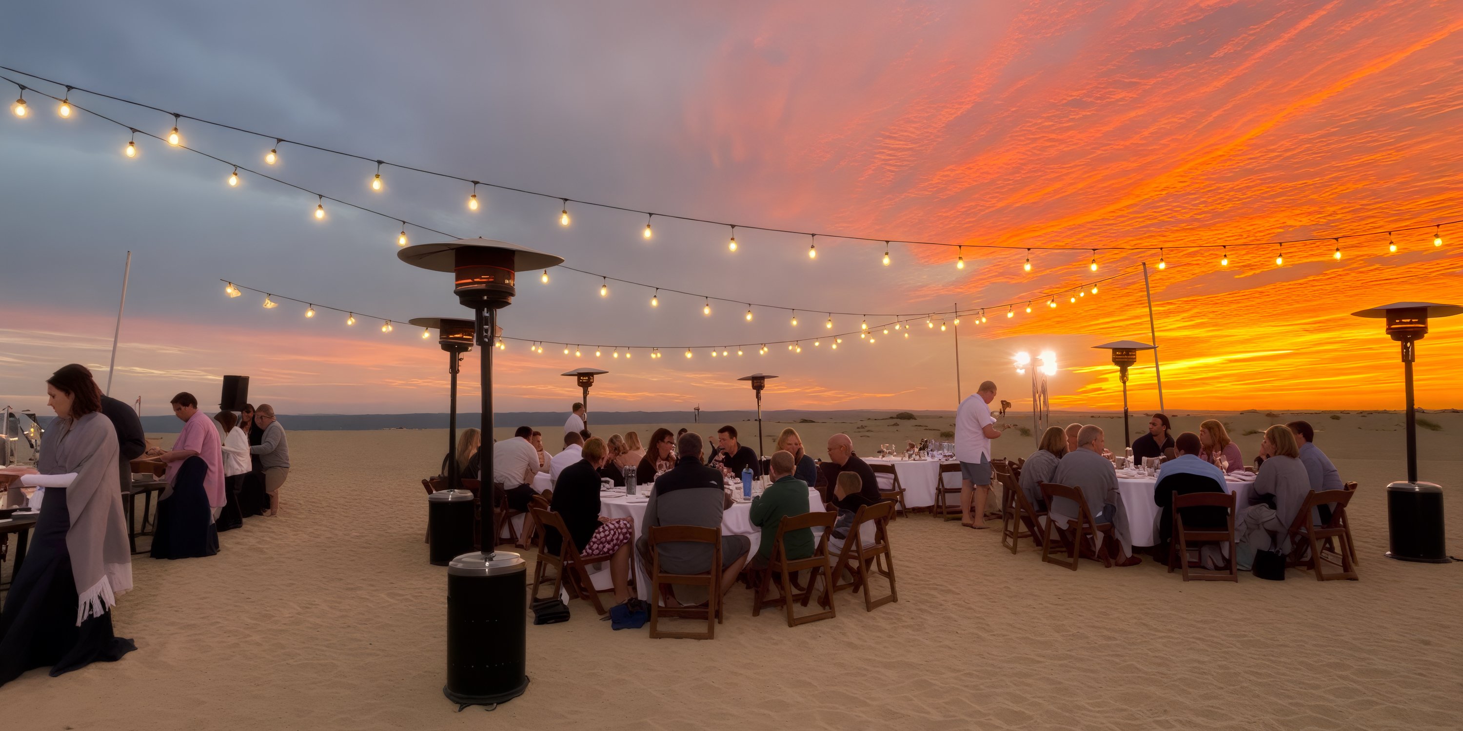 Experience the magic of a destination wedding as you dine under twinkling string lights on the sandy shores at sunset at Hard Rock Los Cabos.