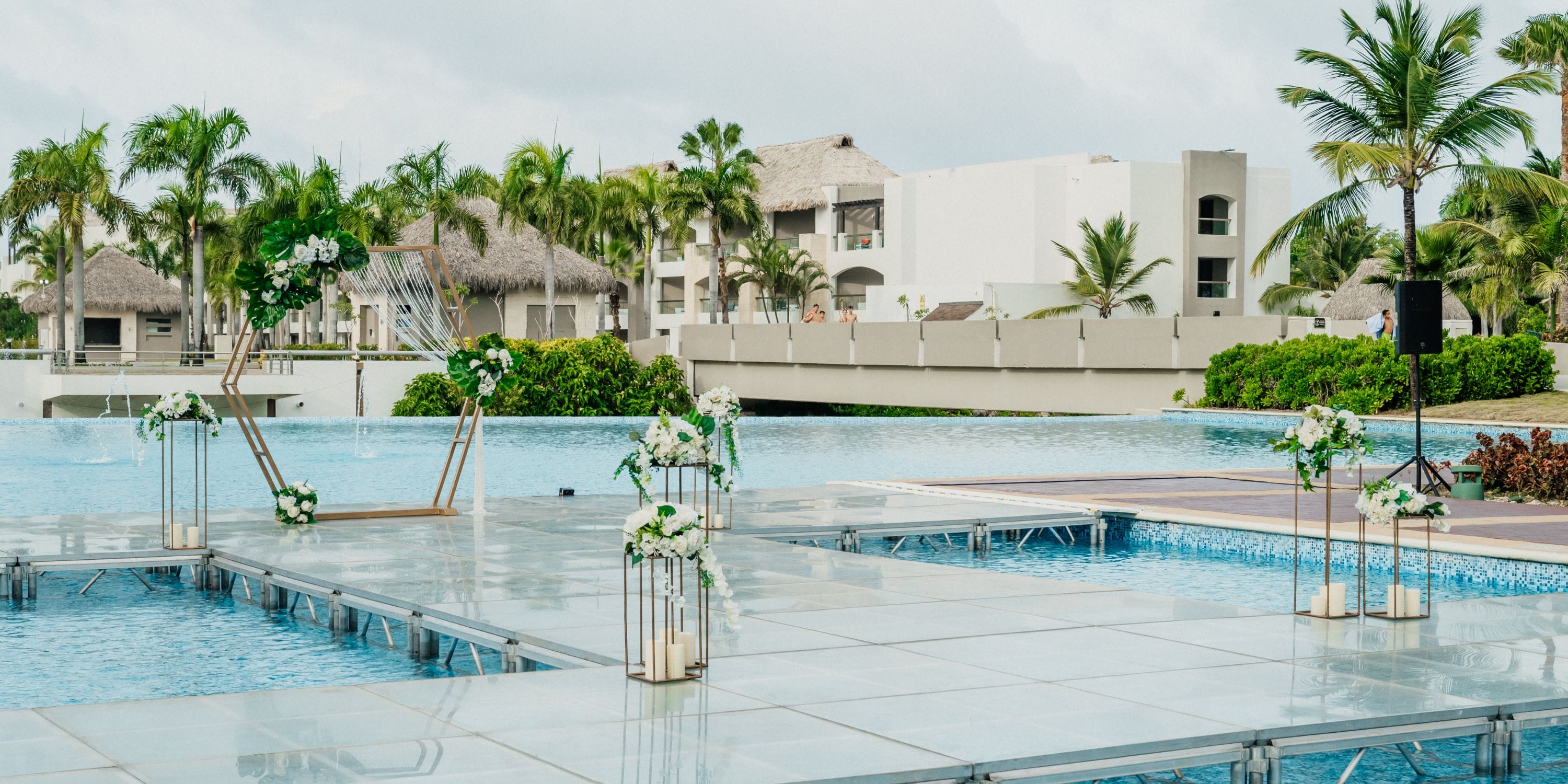 Destination wedding setup at Hard Rock Punta Cana featuring a floating platform adorned with florals.
