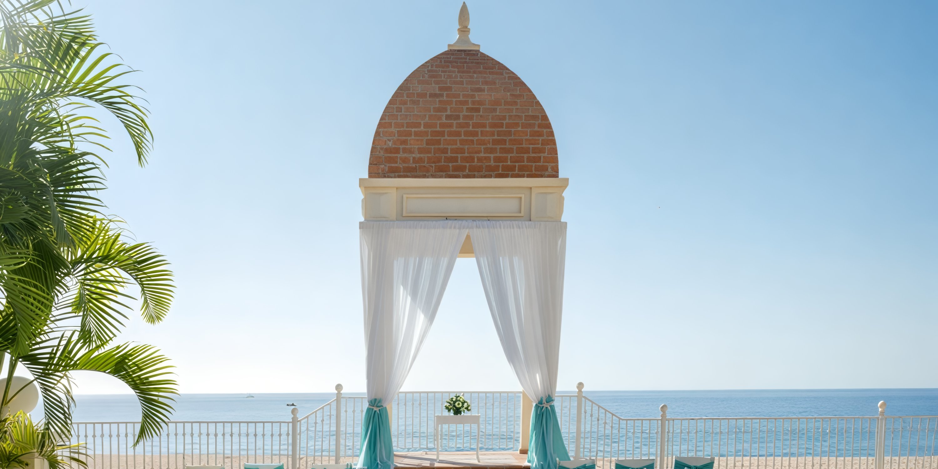 The Riu Palace in Cabo offers a stunning destination wedding setting, featuring an elegant wedding arch adorned with white drapes, overlooking the ocean under clear skies.