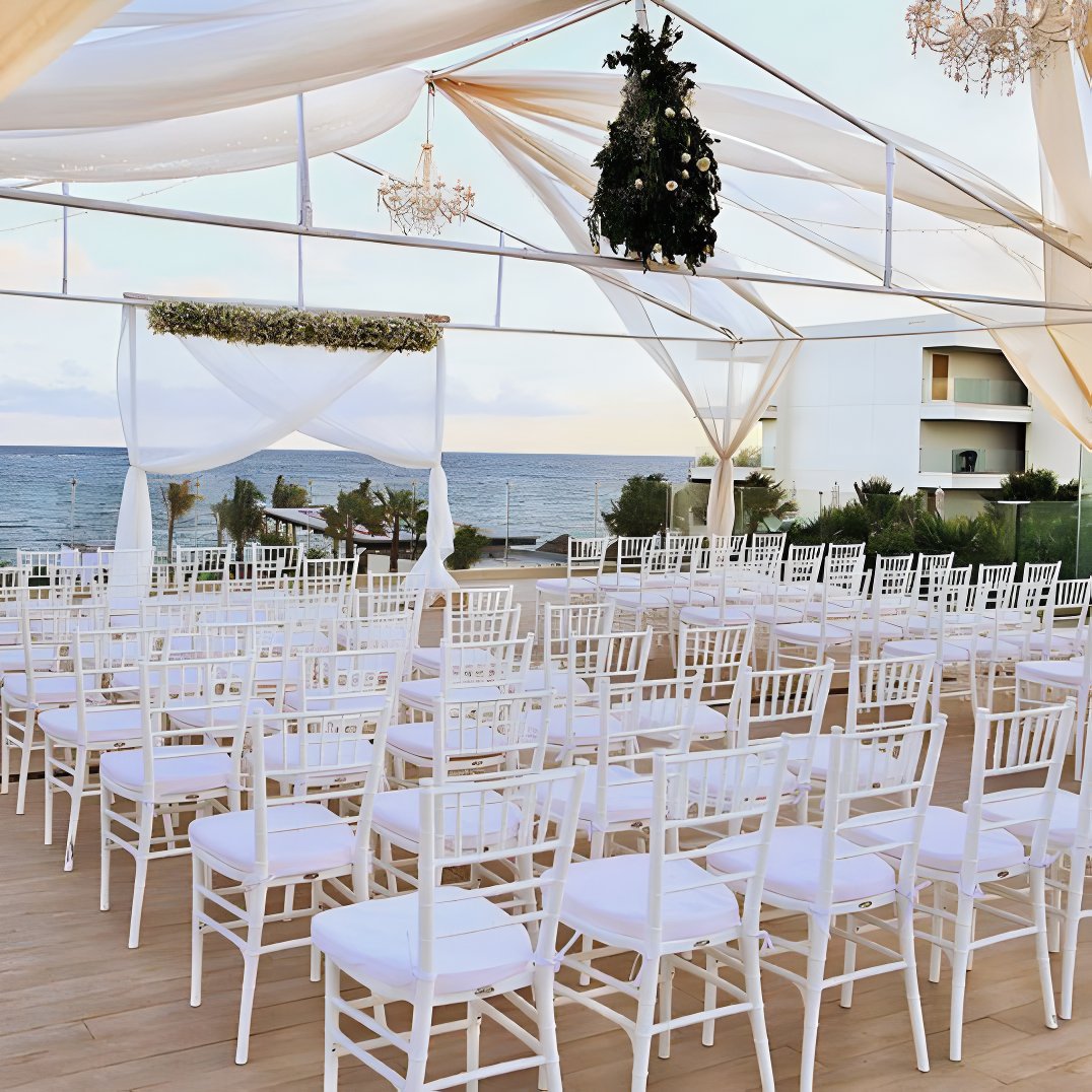 Purple Rooftop destination wedding venue overlooking the ocean at Breathless Riviera Cancun