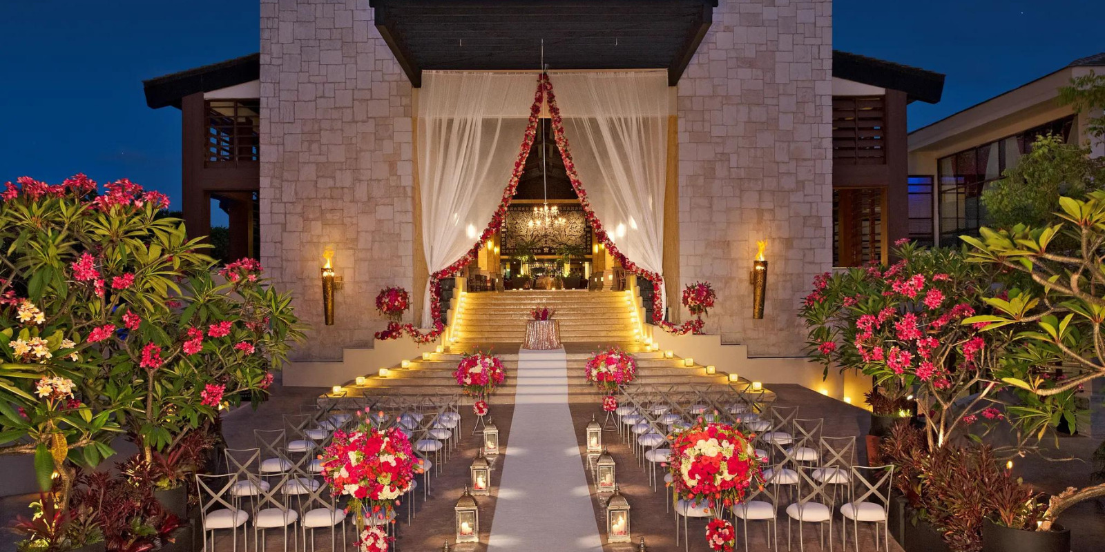 Formal wedding on the lobby staircase of Dreams Riviera Cancun