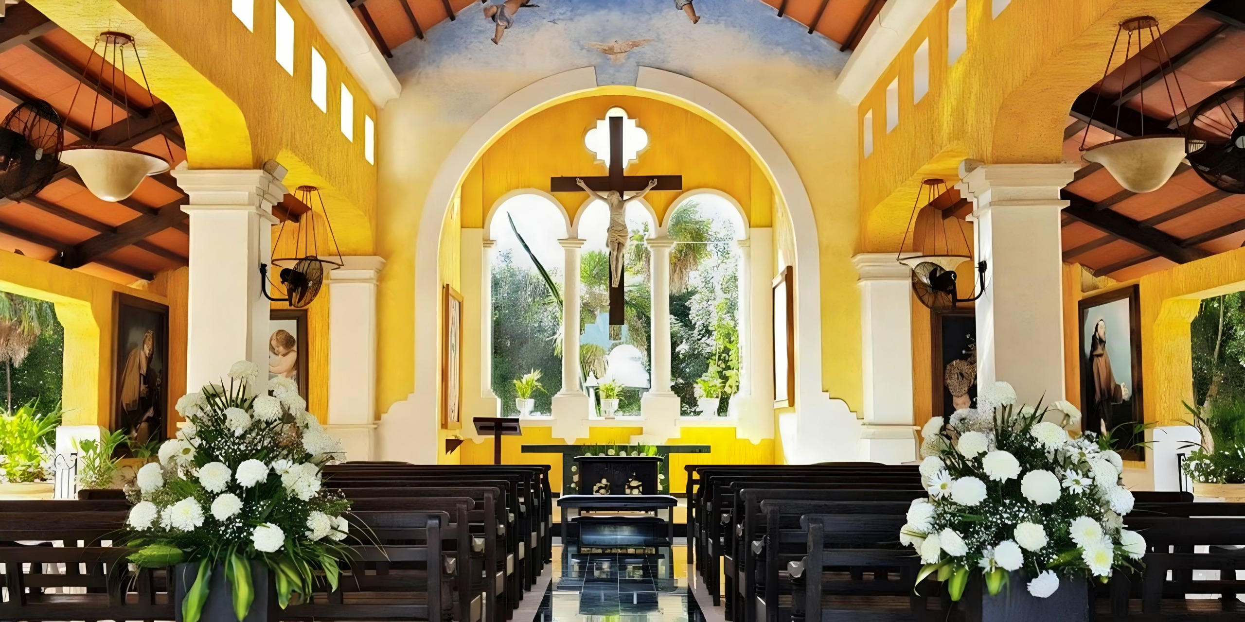 Christian destination wedding in the yellow wedding chapel at Grand Palladium White Sand