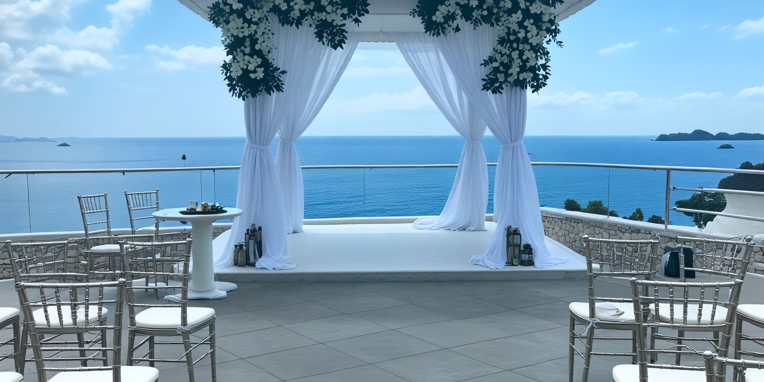 Azul Beach Resort Negril offers a stunning destination wedding setting featuring an outdoor altar adorned with white drapes, surrounded by chairs and overlooking the breathtaking ocean view.