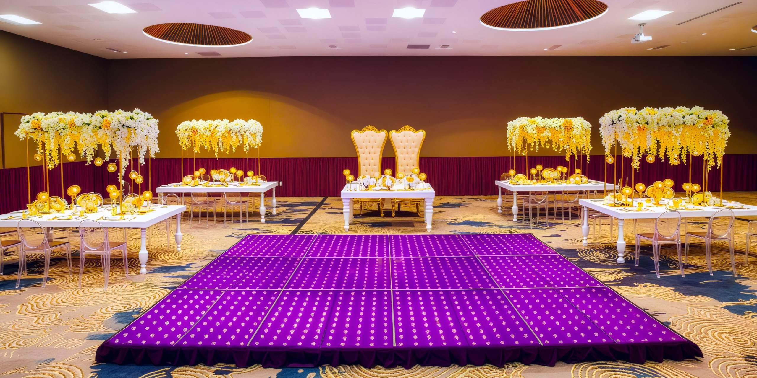 An elegant banquet hall adorned with floral arrangements and featuring a purple dance floor, perfect for a sophisticated wedding or destination wedding.