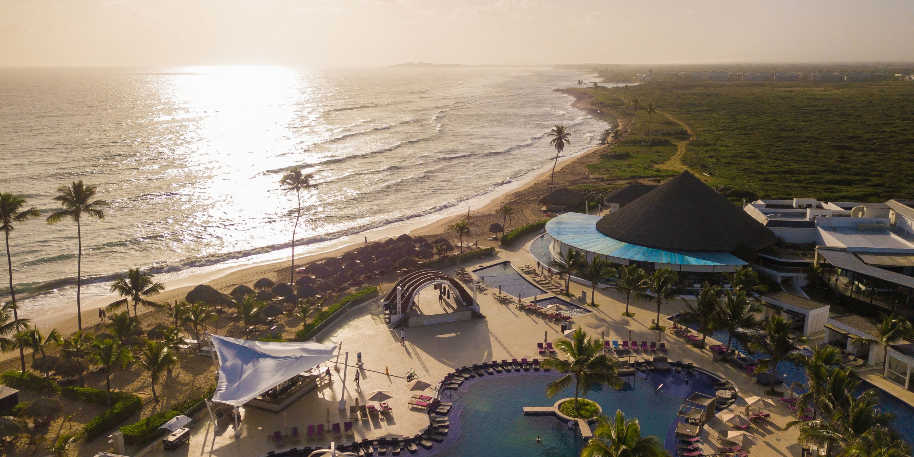 Aerial view of Royalton CHIC Punta Cana, a dreamy destination wedding spot with pools and ocean.