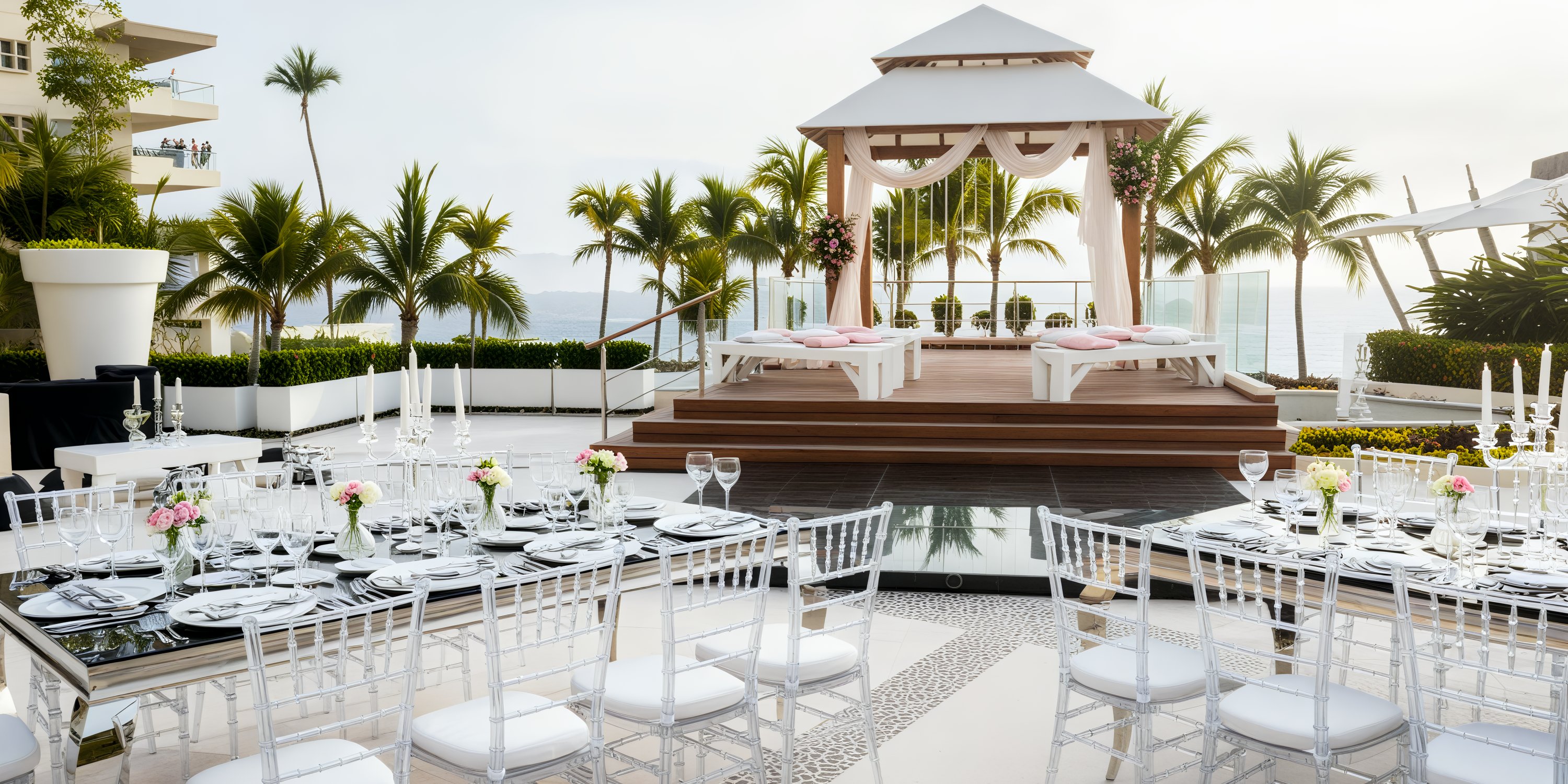 Secrets Vallarta Bay provides a picturesque setting for a destination wedding, featuring a charming gazebo, white chairs, and tables adorned with pink flowers.