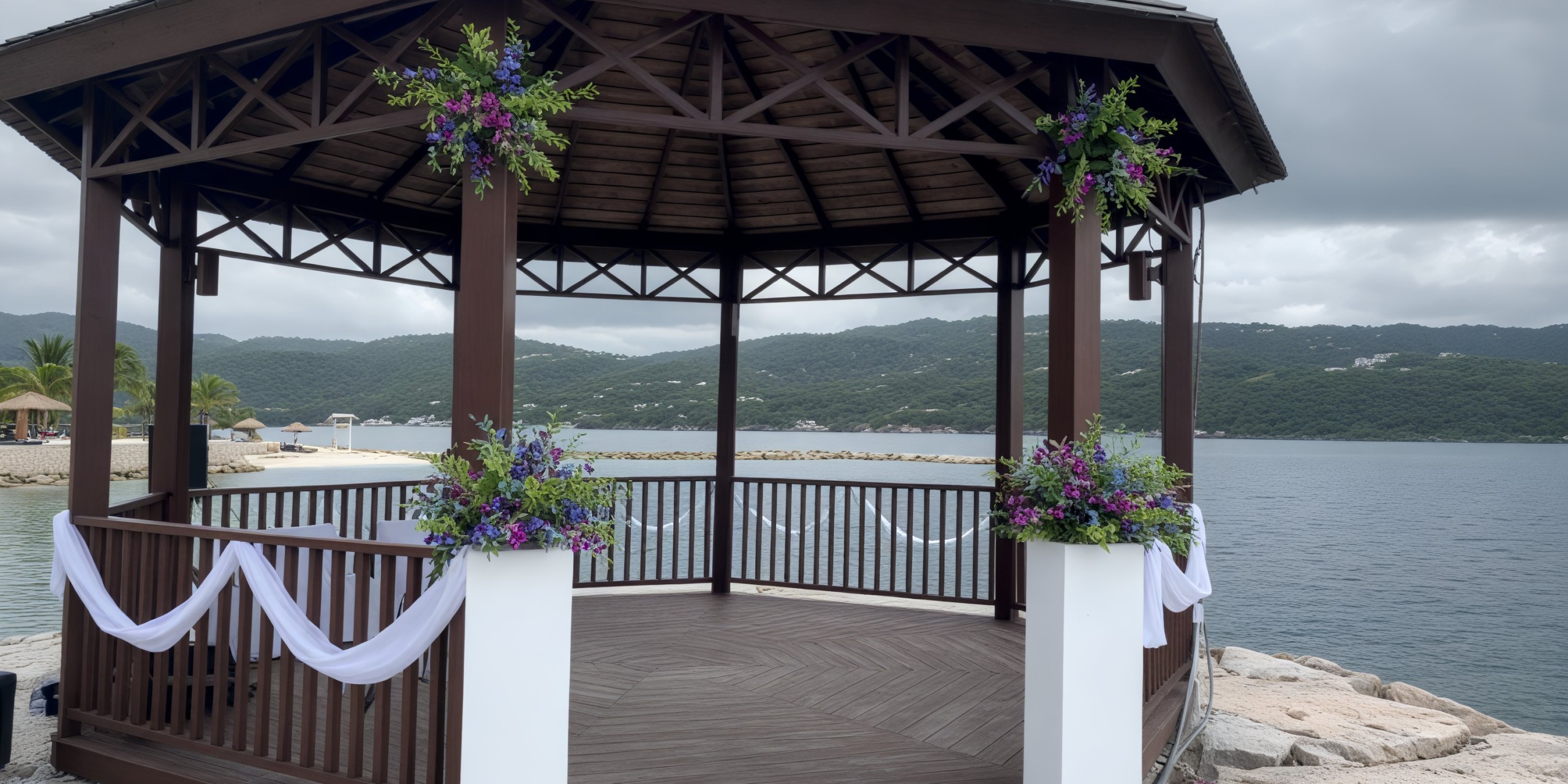The Secrets Wild Orchid gazebo, adorned with flowers and fabric by a tranquil waterfront, creates the perfect setting for a dream destination wedding.