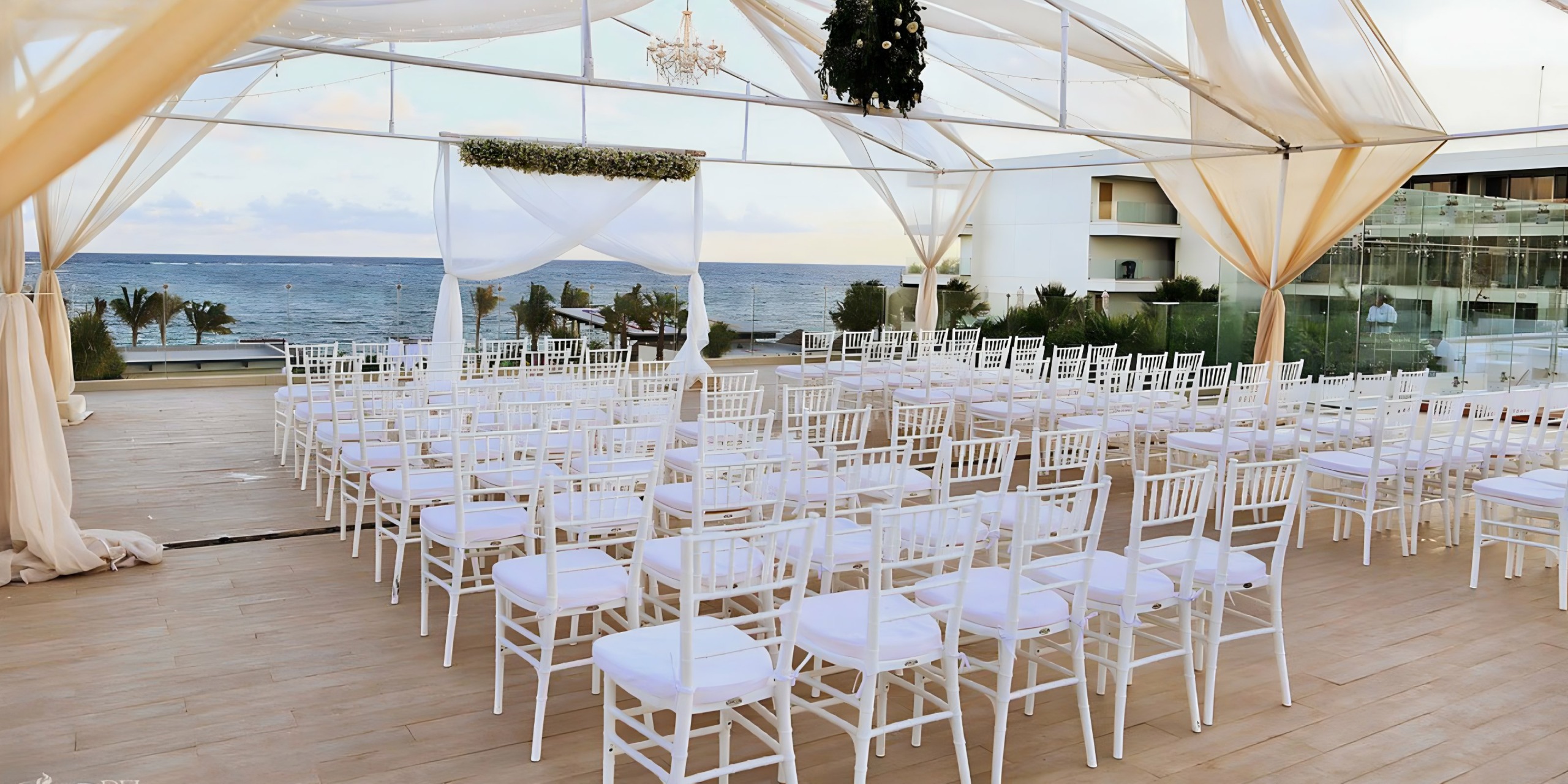 Purple Rooftop destination wedding venue overlooking the ocean at Breathless Riviera Cancun