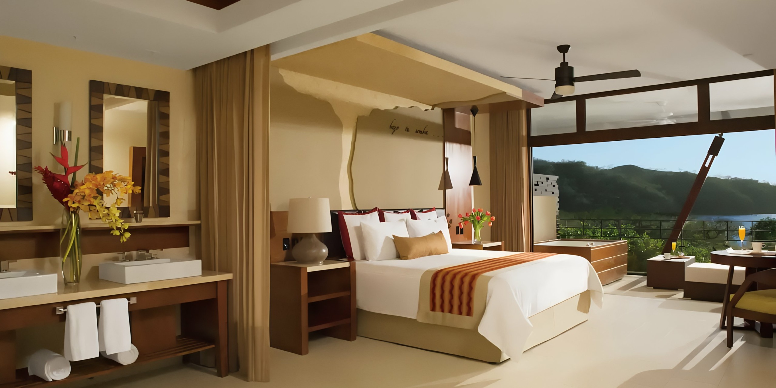 Dreams Las Mareas Spacious and luxurious bedroom with a scenic view, featuring a king-sized bed, contemporary furnishings, and warm lighting.