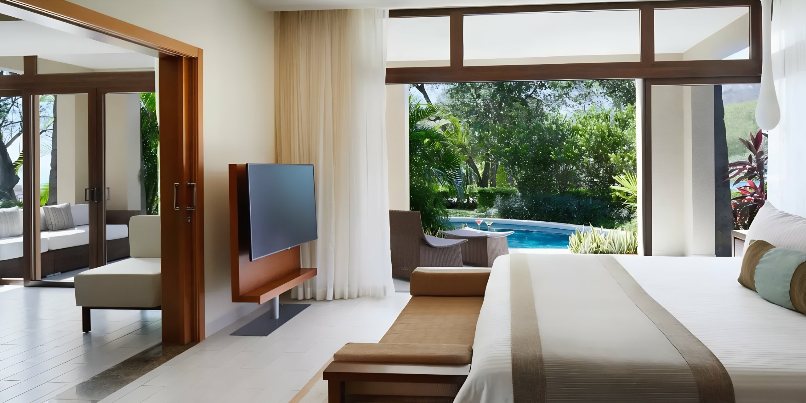 Dreams Las Mareas hotel room with a pool view, featuring a large bed, flat-screen tv, and minimalist furniture.