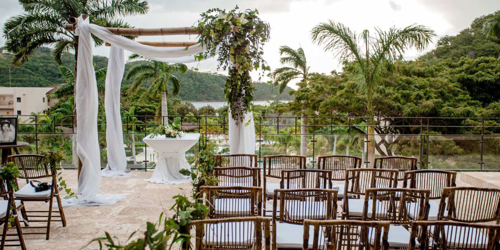 A Dreams Las Mareas destination wedding ceremony set up in a tropical setting.