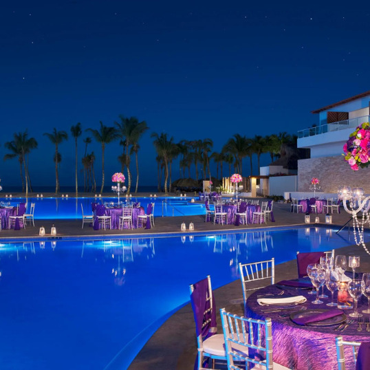 Poolside destination wedding reception at Dreams Dominicus La Romana Dominican Republic