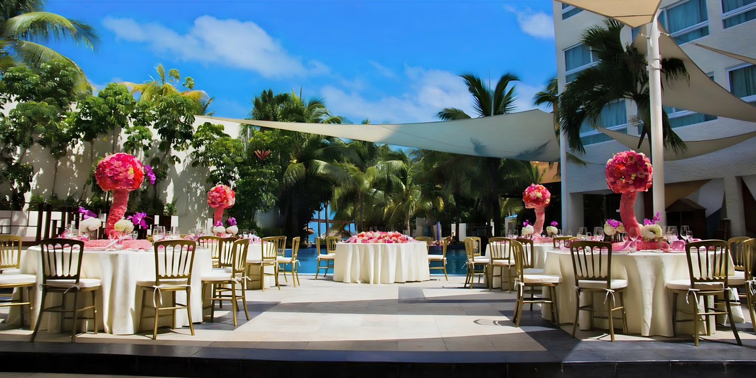 Cel patio destination wedding venue and wedding reception at Dreams Sands Cancun resort Caribbean Sea and Nichupté lagoon
