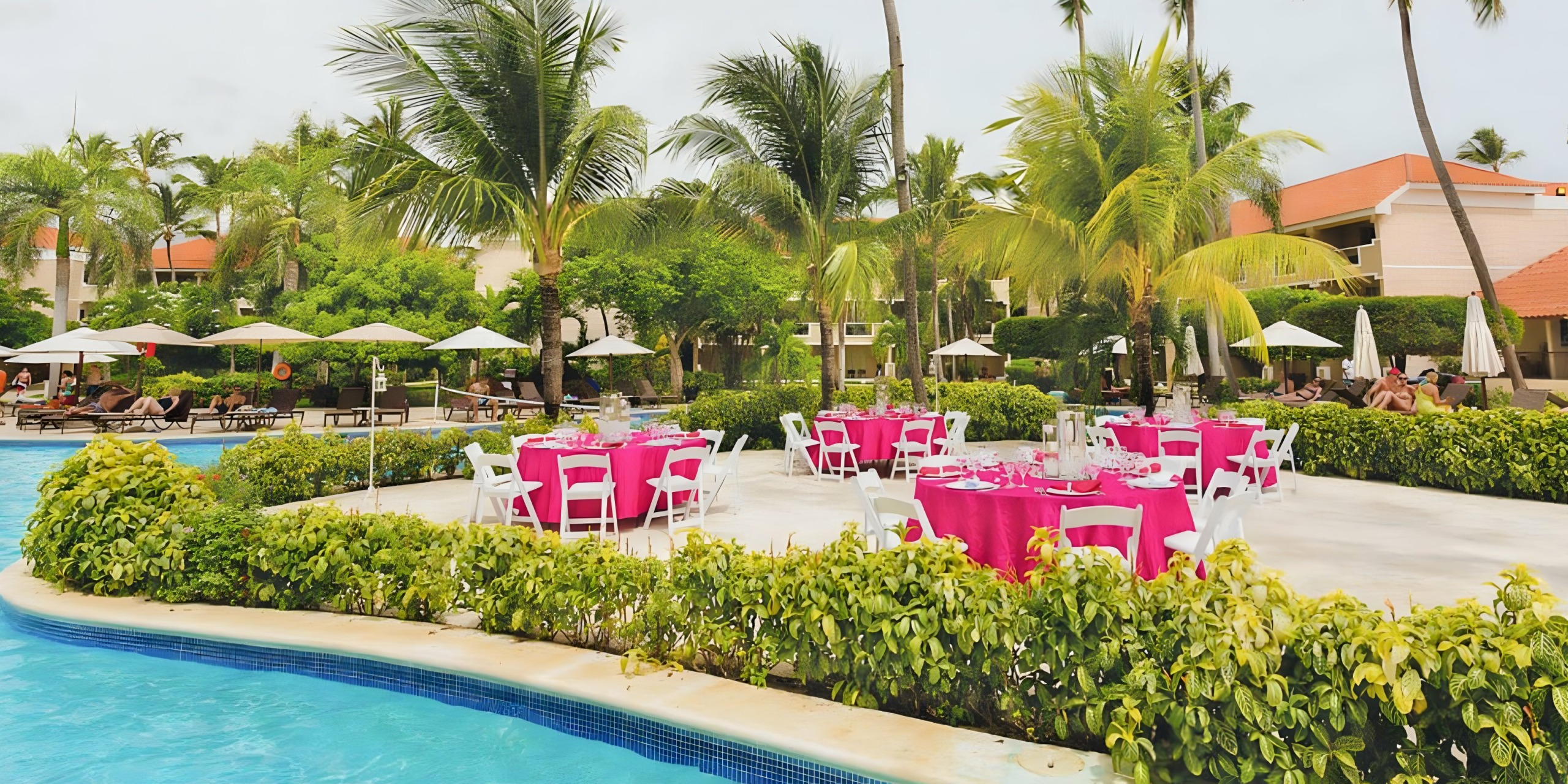 Poolside wedding reception wedding venue at Dreams Palm Beach Punta Cana Dominican Republic