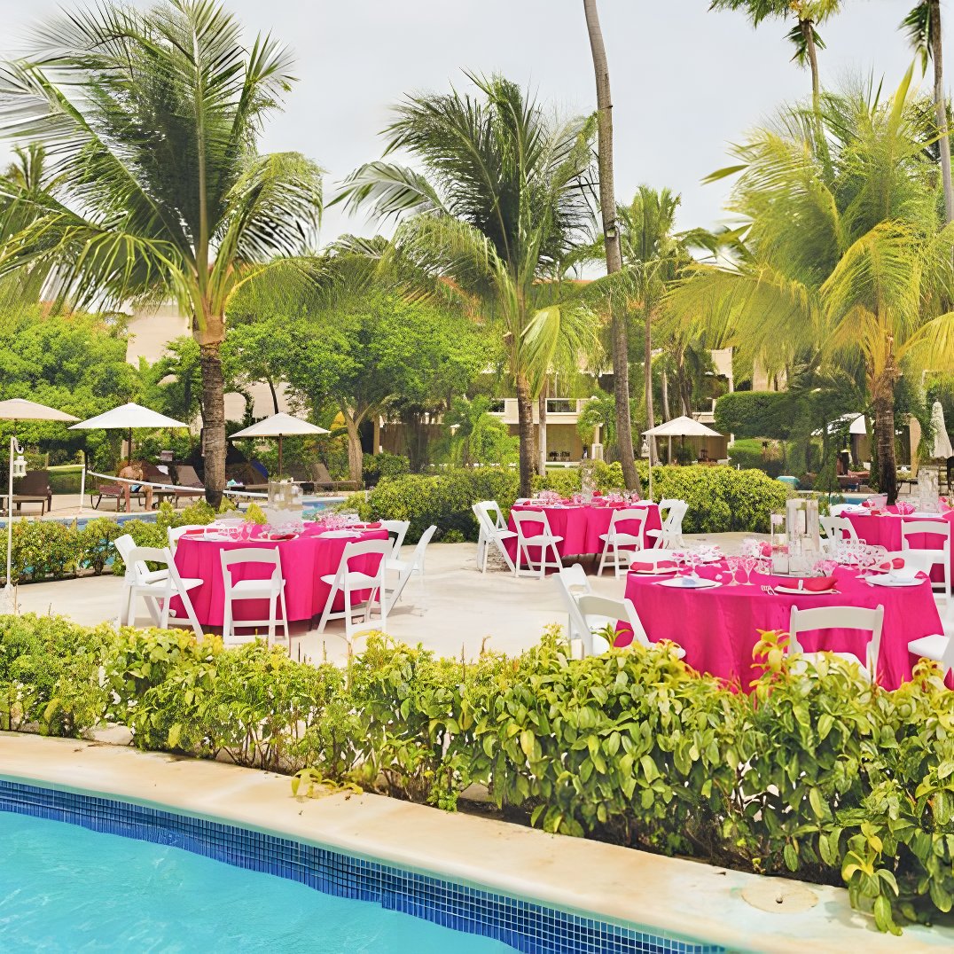 Poolside wedding reception wedding venue at Dreams Palm Beach Punta Cana Dominican Republic