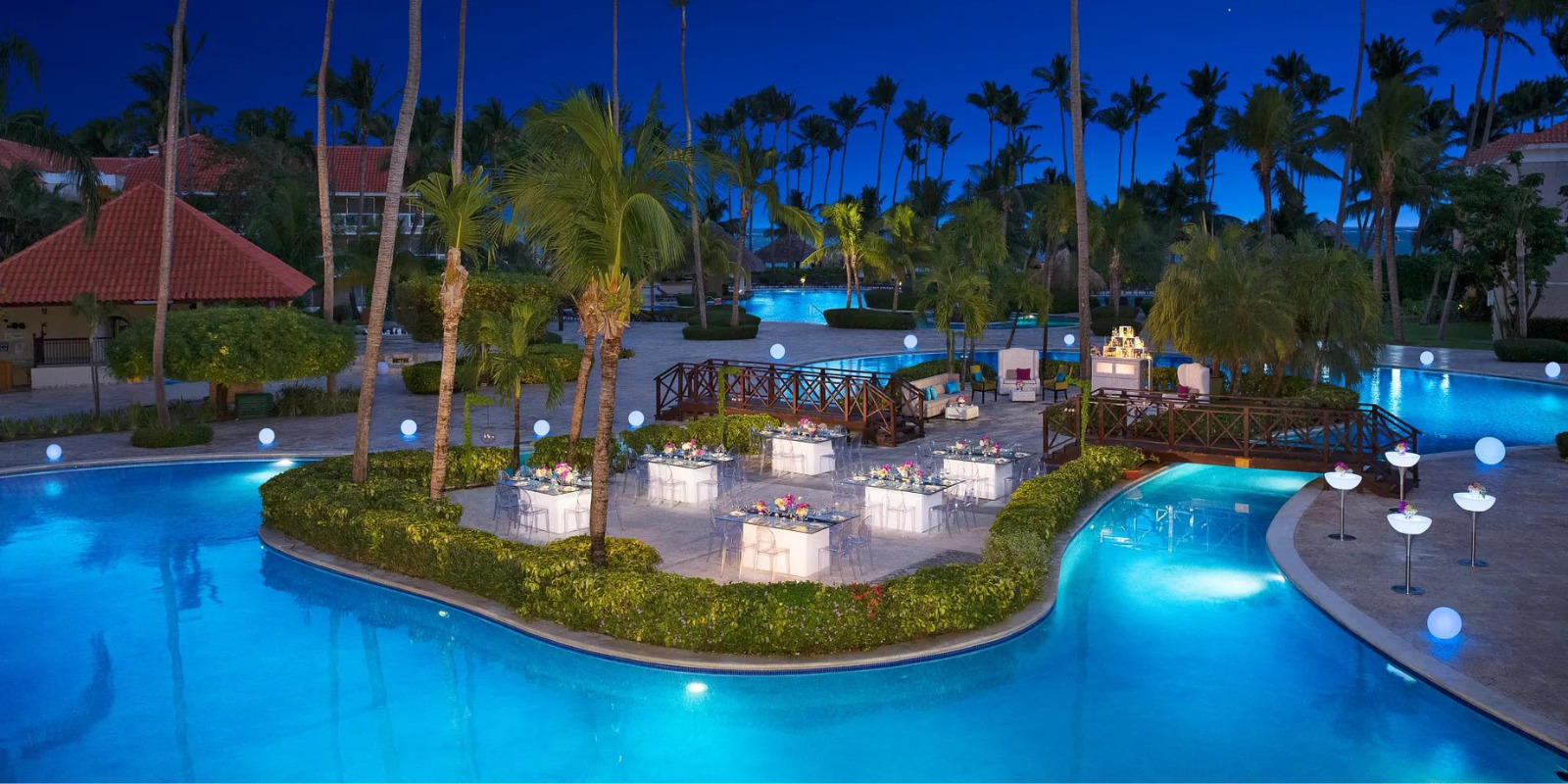 Dreams Palm Beach Pool Island destination wedding reception venue.