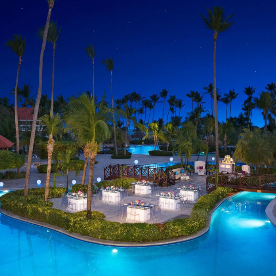 Dreams Palm Beach Pool Island destination wedding reception venue.