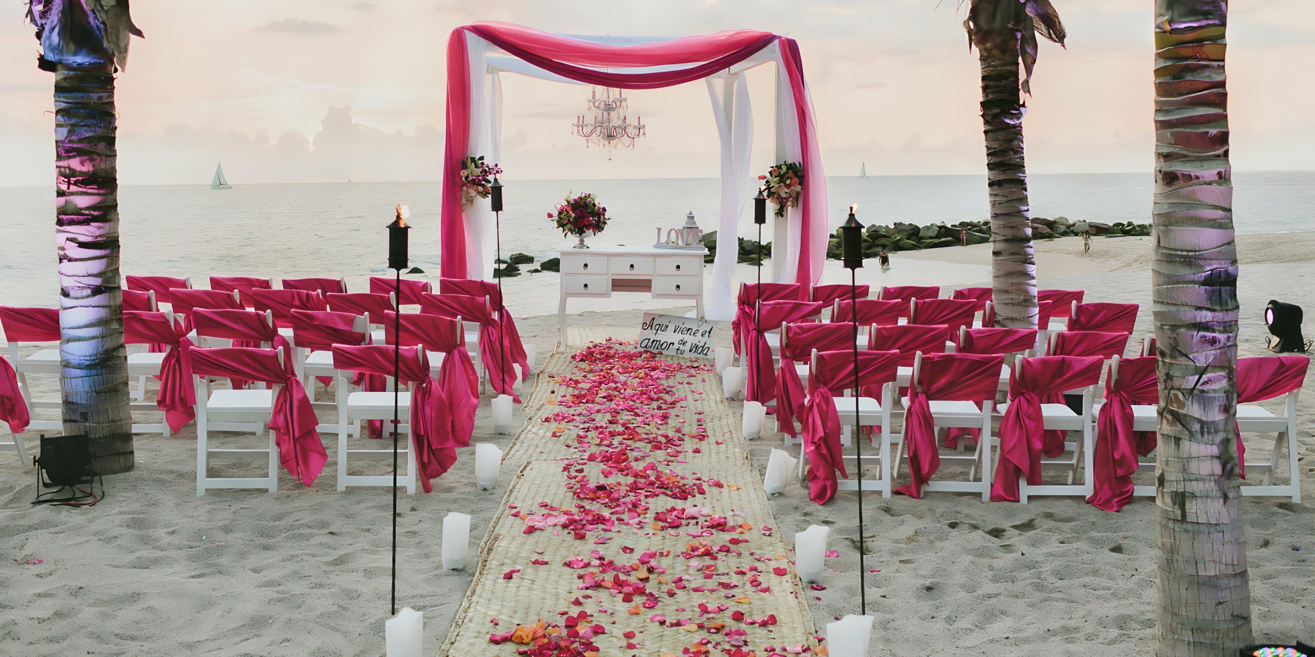 Wedding rose petals and canopy on the beach destination wedding at Fiesta Americana Puerto Vallarta