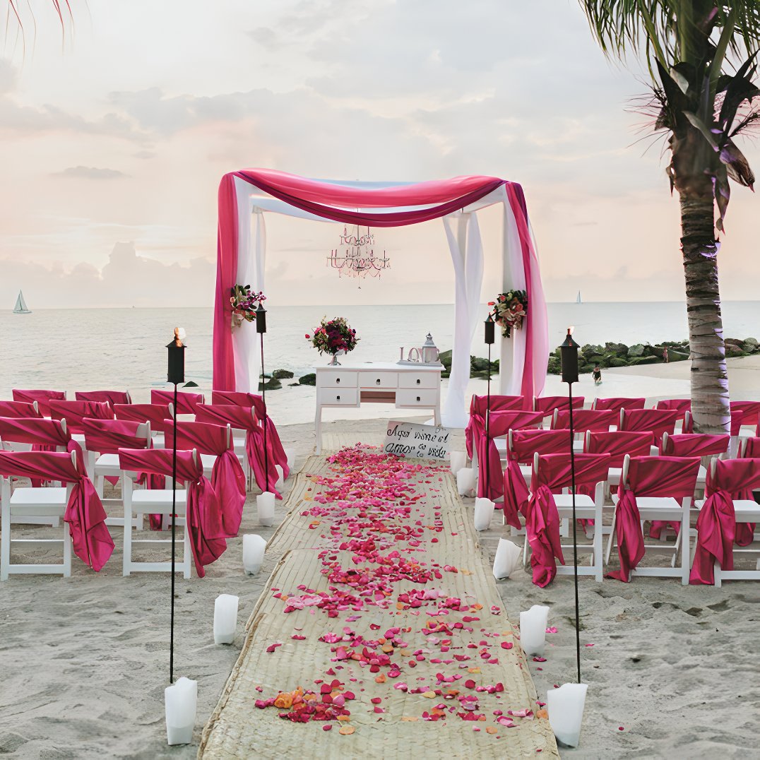 Fiesta Americana Puerto Vallarta beach destination wedding with rose petals and wedding canopy on the beach