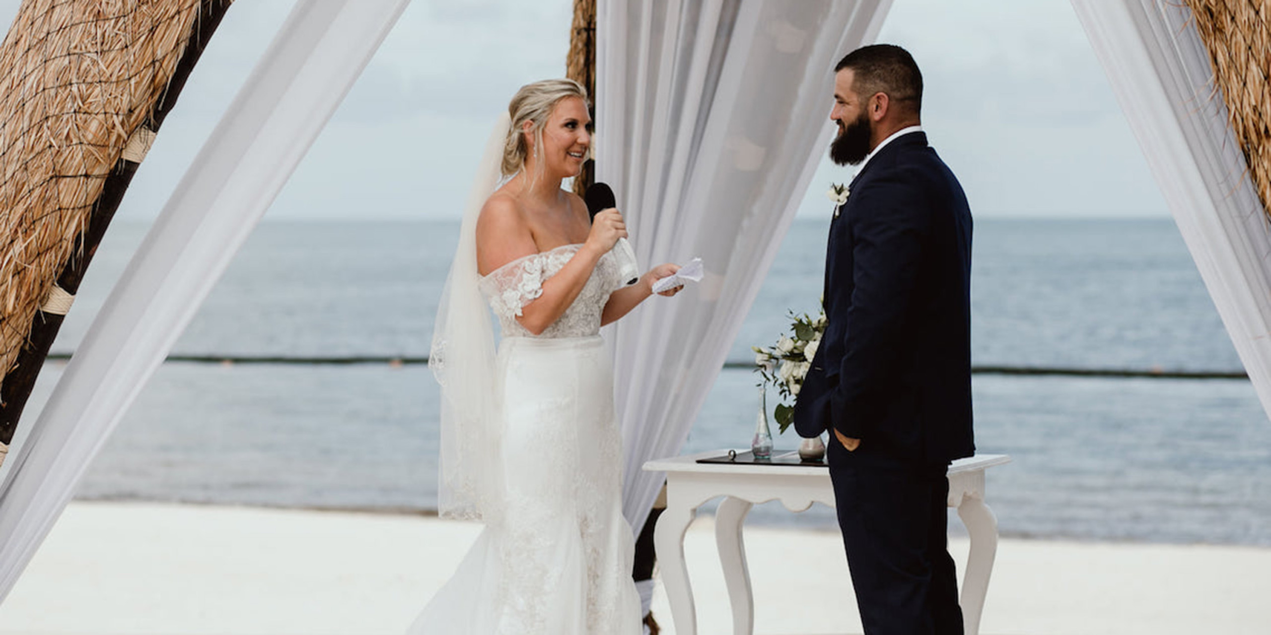 Hannah and Ben read their vows during their dream Destify destination wedding