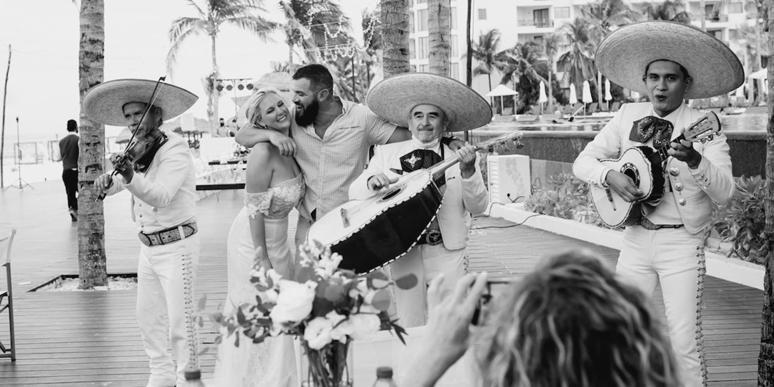 Hannah and Ben celebrate with a mariachi band