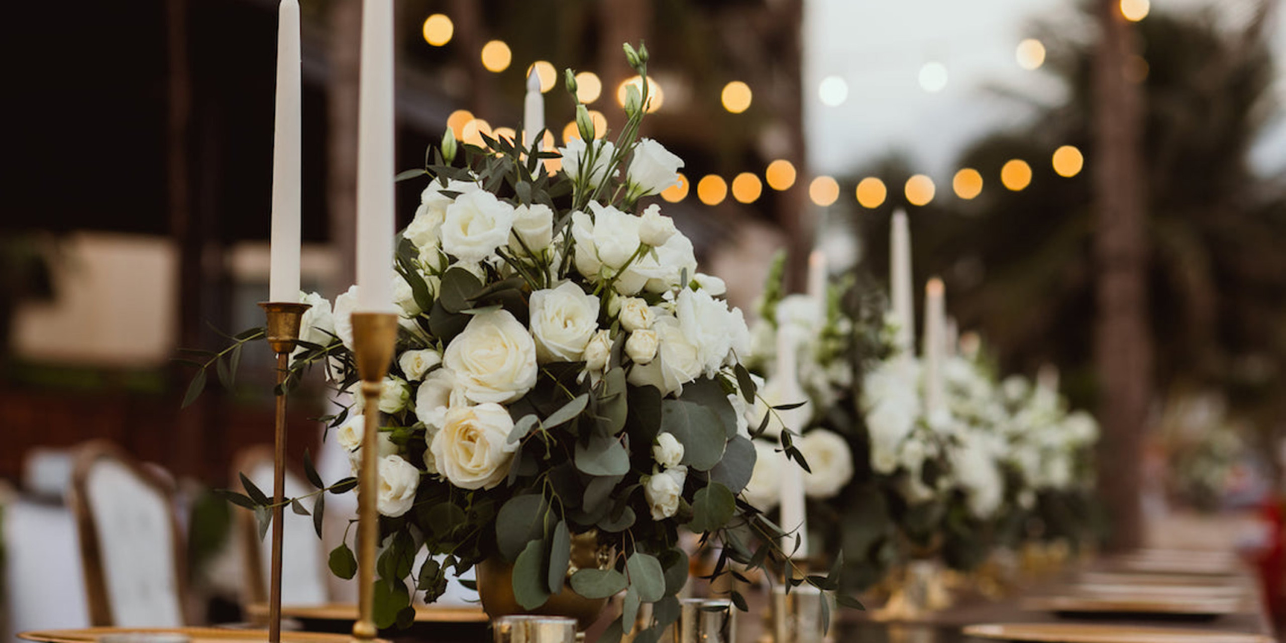 Beautiful flower centerpieces at Hannah and Ben wedding reception