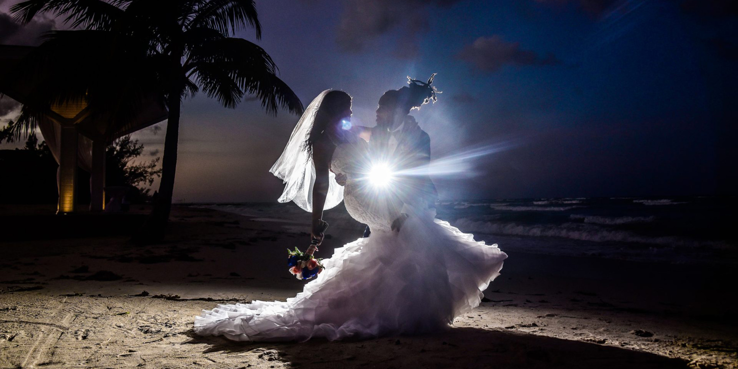 Jasmeka and Sylvester embrace during their destination wedding by Destify