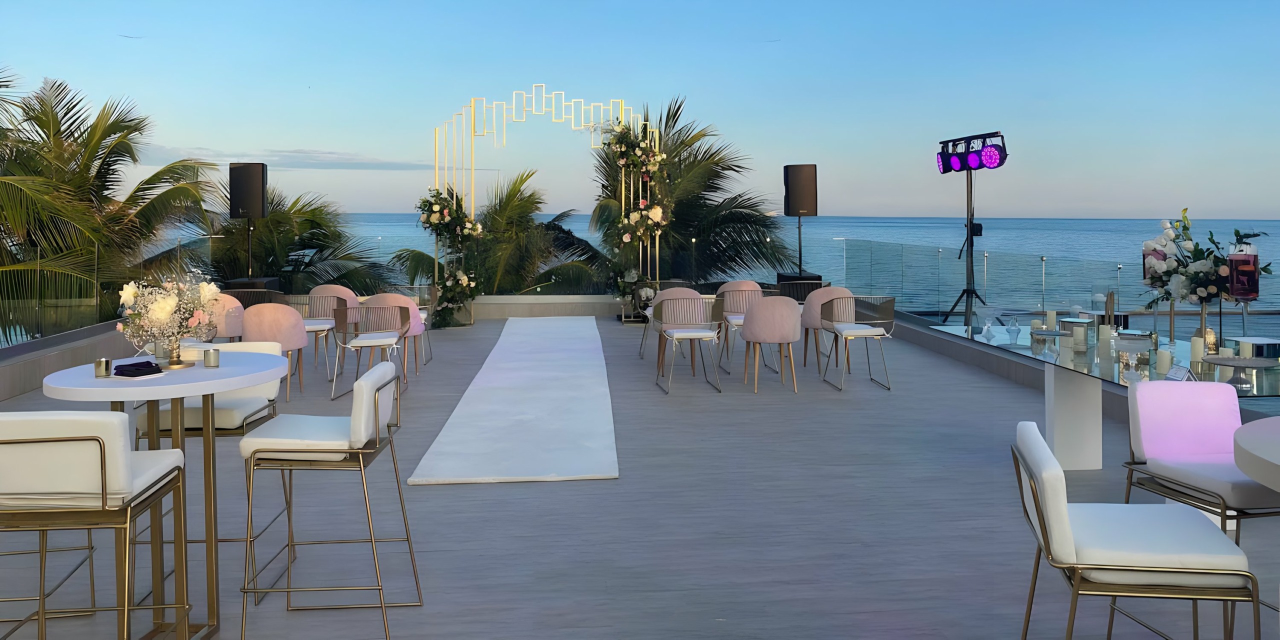 A wedding reception at Breathless Riviera Cancún Resort & Spa overlooking the ocean.