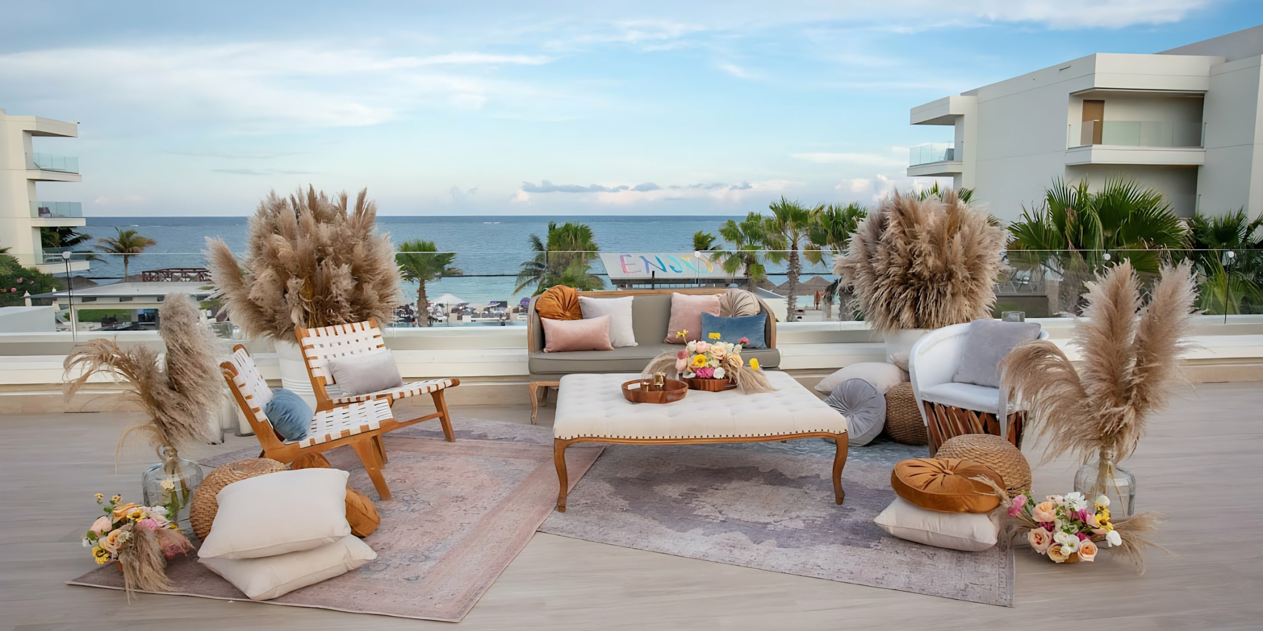 A wedding reception set up at Breathless Riviera Cancún Resort & Spa overlooking the ocean.