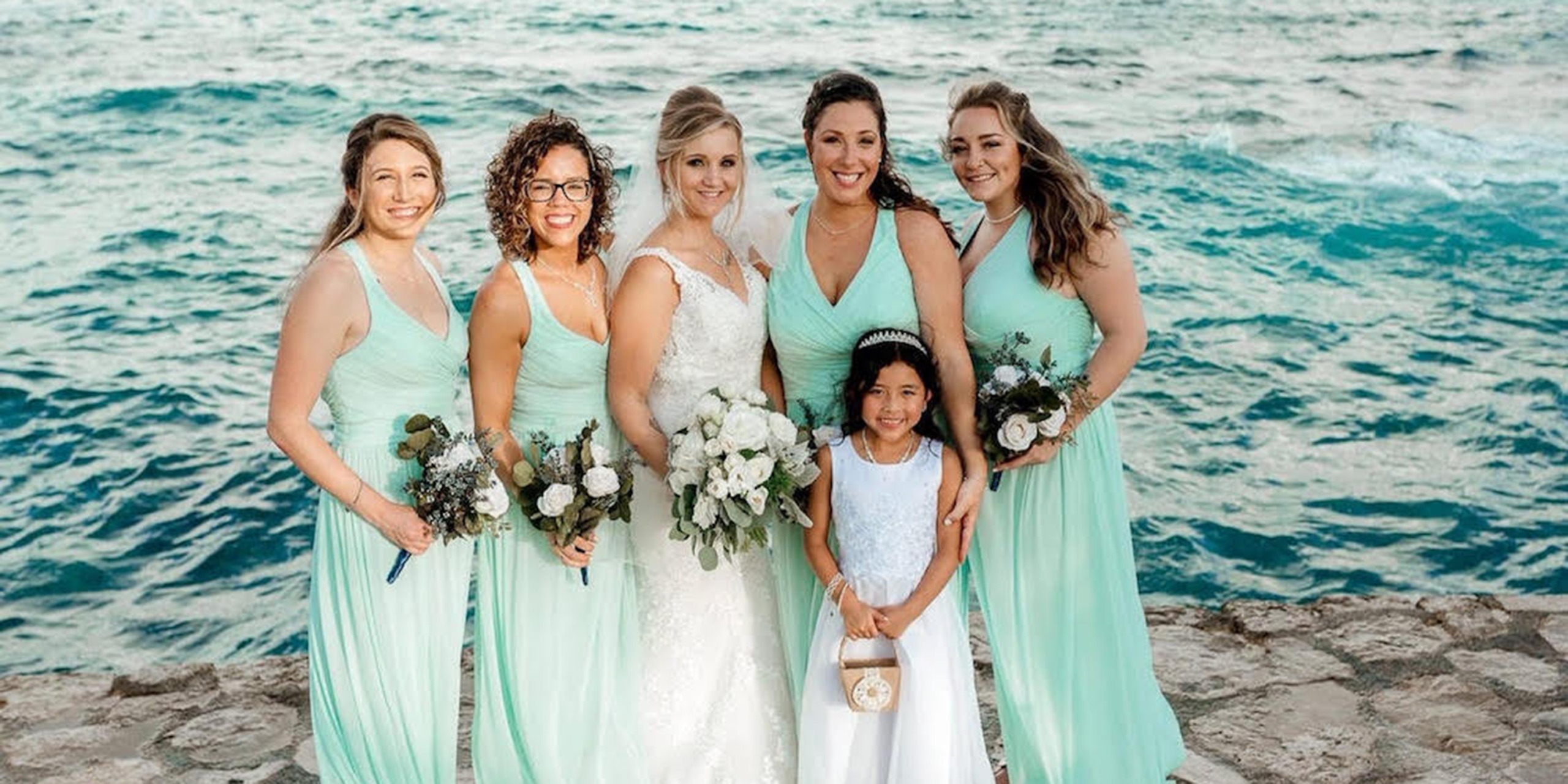 Tiana and Jessica pose with their wedding party