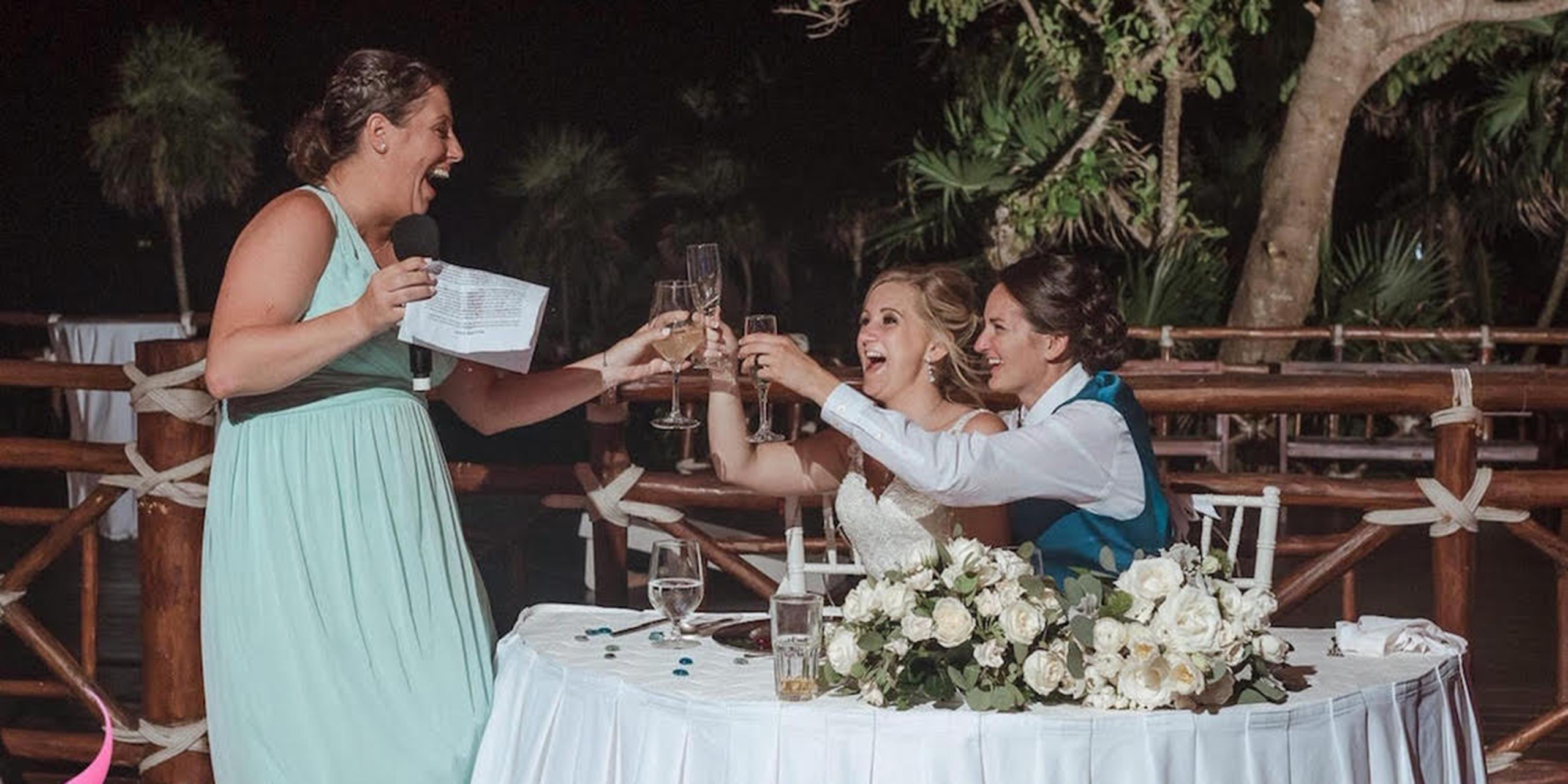 Tiana and Jessica toast their wedding