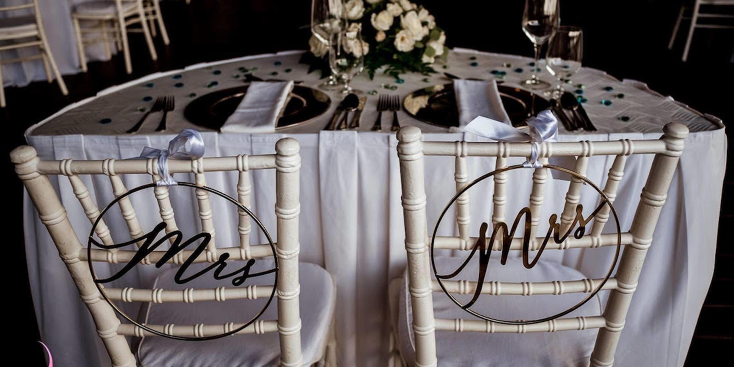 Mrs and Mrs chairs at the same sex wedding of Tiana and Jessica
