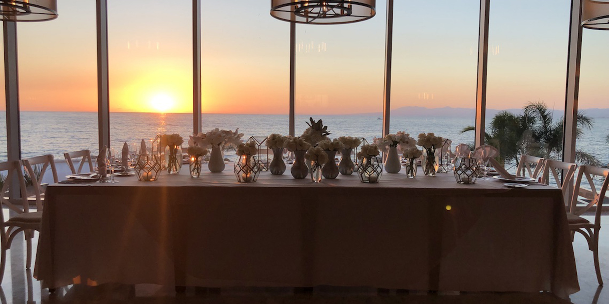 The beautiful longtable reception of Tramaine and Shannon and their friends at their wedding reception