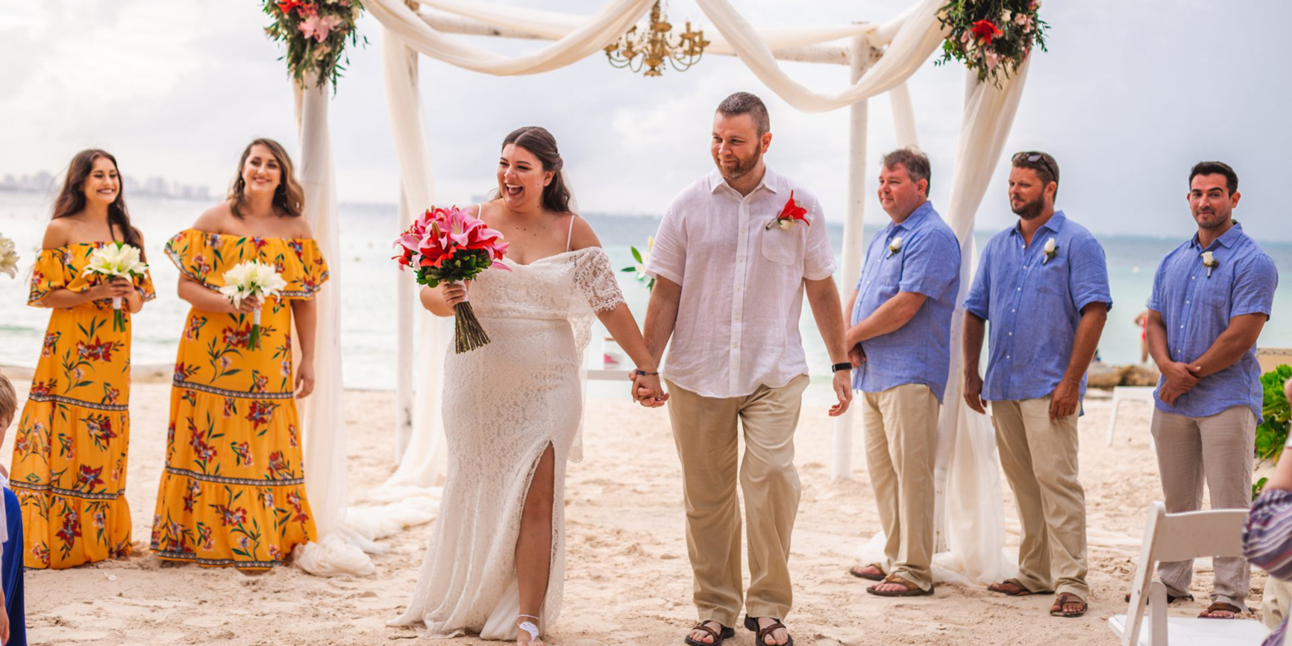 Newlyweds Waylon and Megan walk back up the aisle amongst their friends and family at their Waylon and Megan Destify destination dream wedding