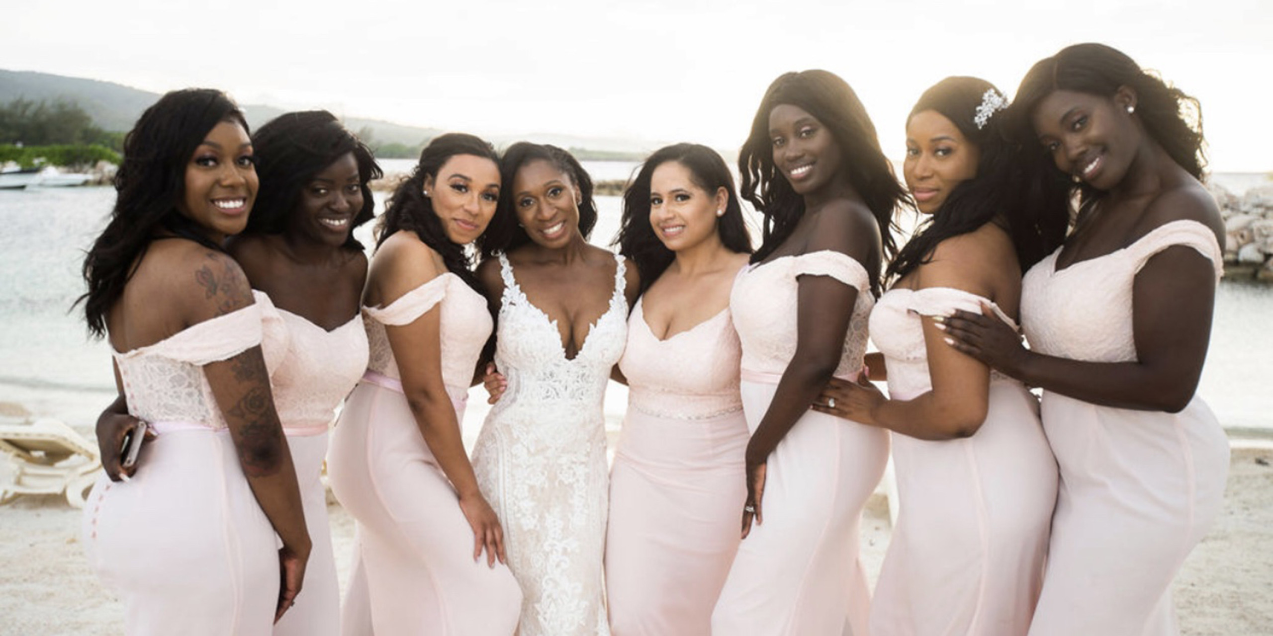 Bride Wokie poses with her bridesmaids at the Wokie and James wedding