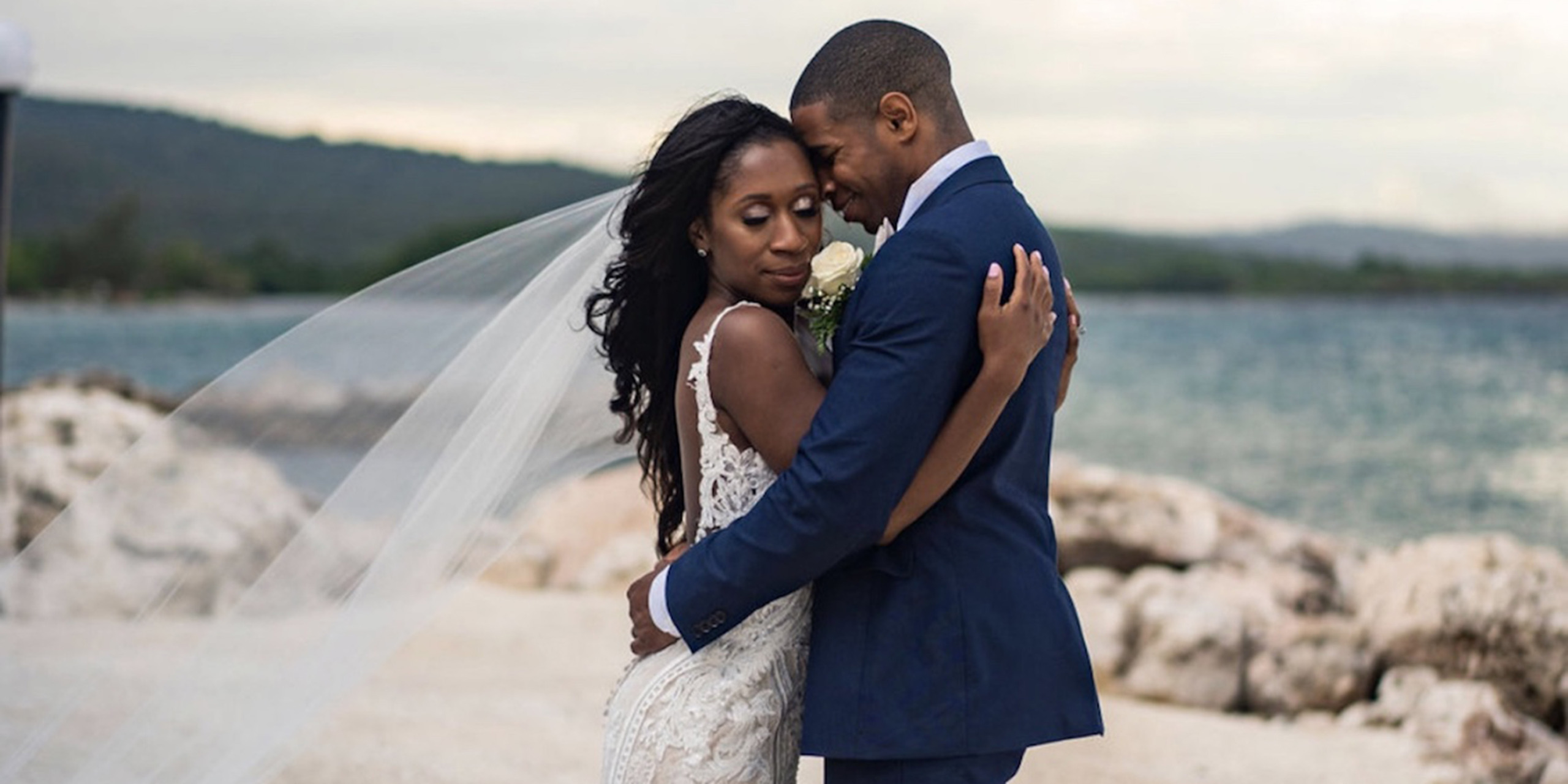 Newlyweds Wokie and James embrace