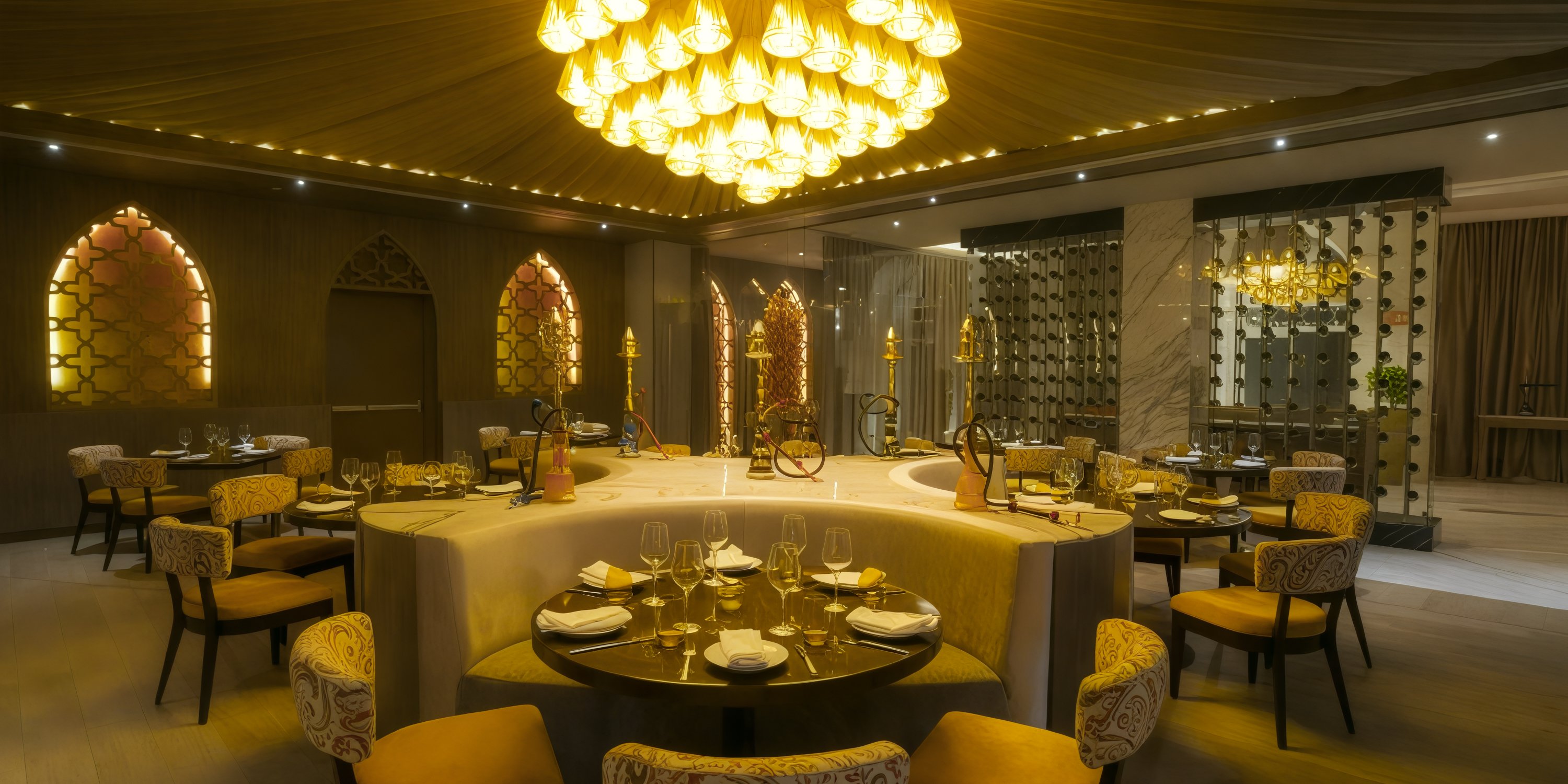 Moon Palace The Grand offers a luxurious restaurant interior with elegant decor and warm lighting, making it an ideal setting for a destination wedding.