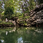 Couple embracing at cenote bonanza Generations Riviera Maya