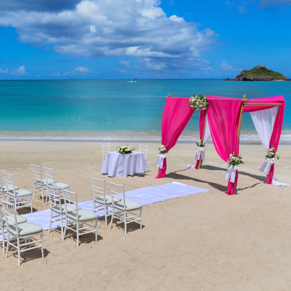 Intimate pink beach destination wedding at Royalton Antigua