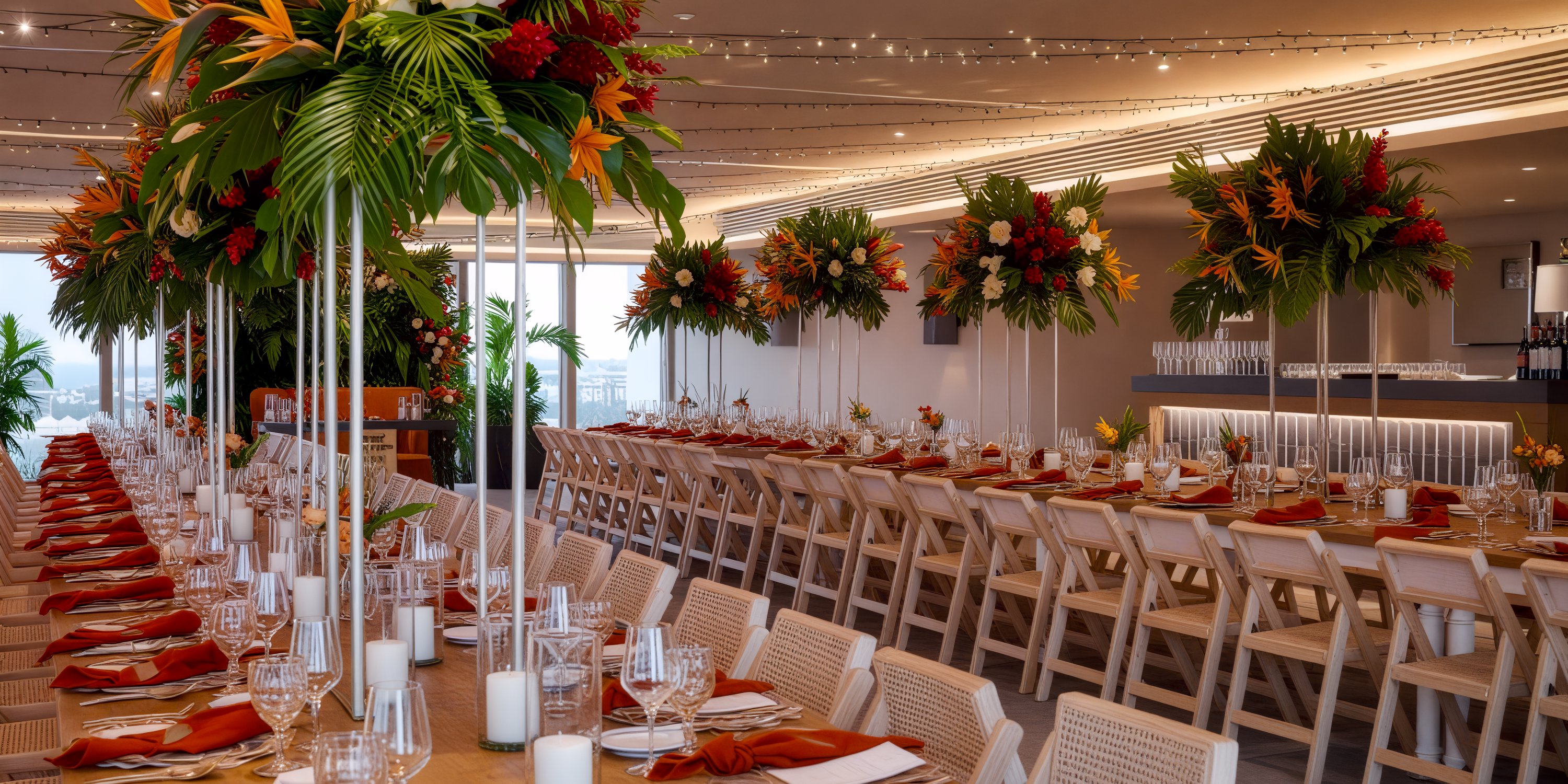 Secrets Moxche Playa del Carmen provides an elegant setting for your destination wedding, featuring a chic banquet hall adorned with tropical florals and illuminated by string lights.