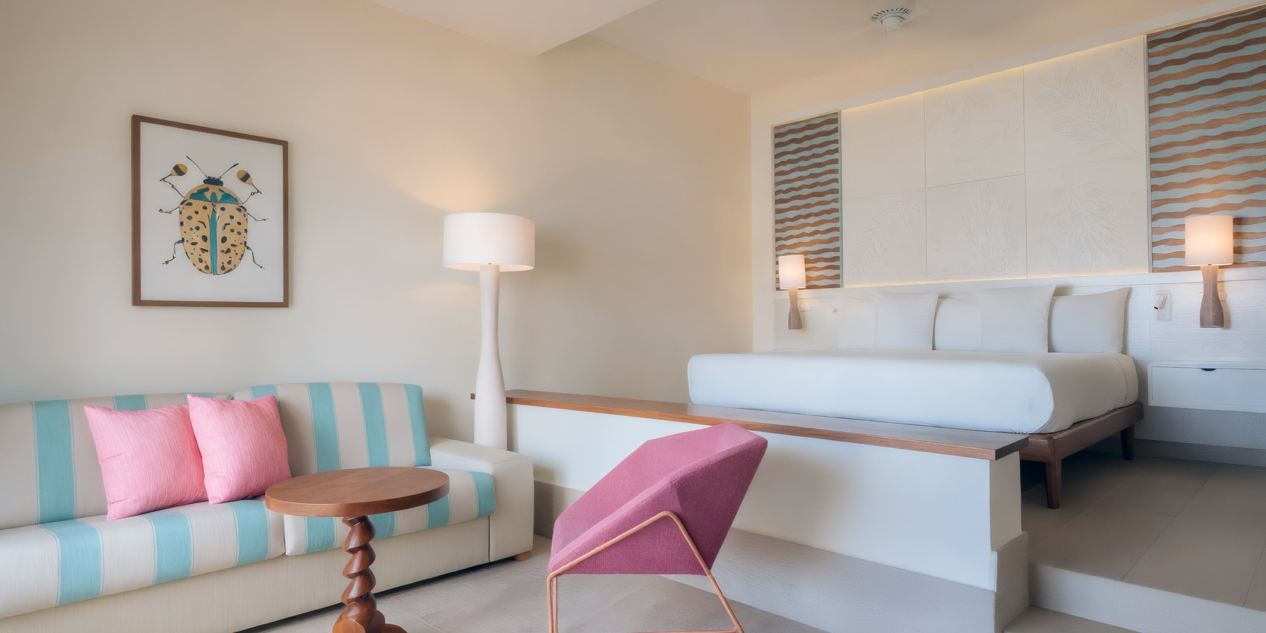 The Coral Level at Iberostar Selection Bavaro offers a modern hotel room featuring a striped sofa, pink chair, wooden table, and bed. Beetle-themed wall art accentuates the decor in this well-lit space with natural and artificial light.