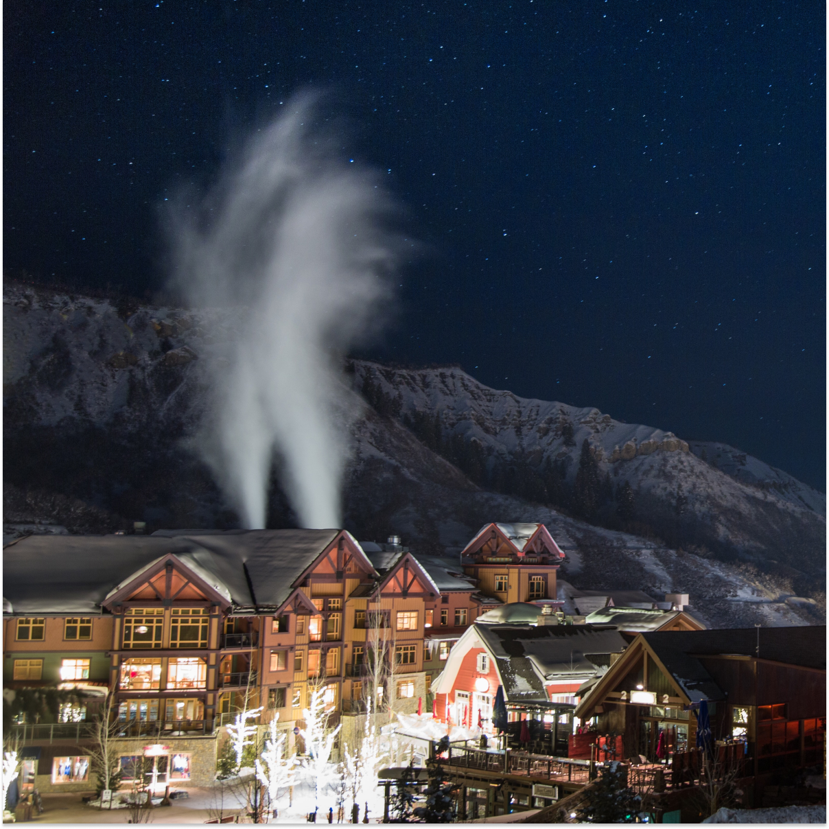 Vail Colorado downtown at night with steam and smoke and the rockies 5 Amazing Things To Do in Vail, CO