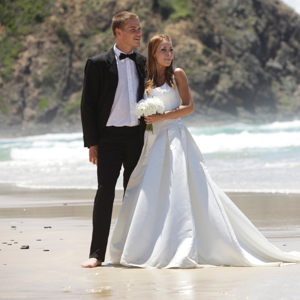 Couple on the beach of a destination wedding