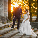 A couple walks the steps after their wedding with a Dominican Republic Wedding Package