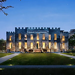 An artist's rendering of a castle at night, envisioned as a destination wedding venue.